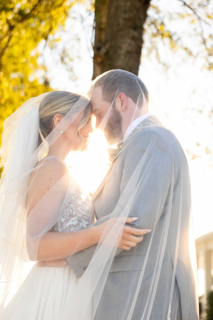 bride and groom shares an intimate moment at their wedding in atlanta georgia