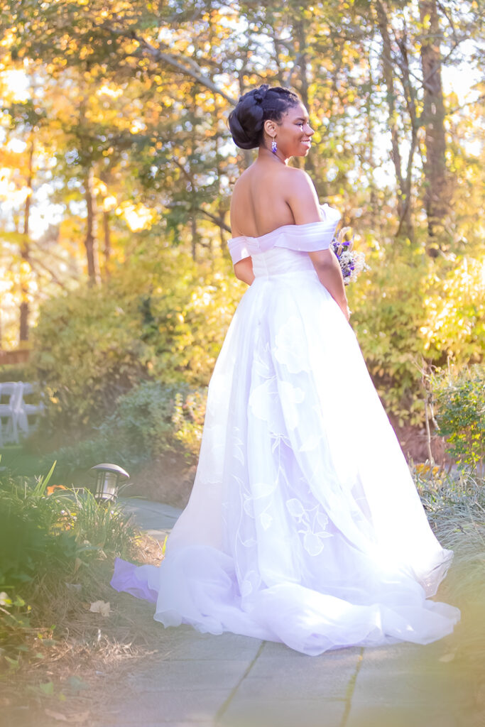 bride poses elegantly at four oaks manor