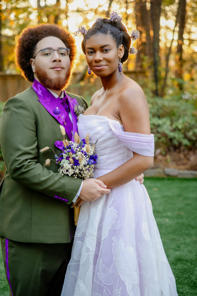 bride and groom embrace during golden hour at their wedding at four oaks manor