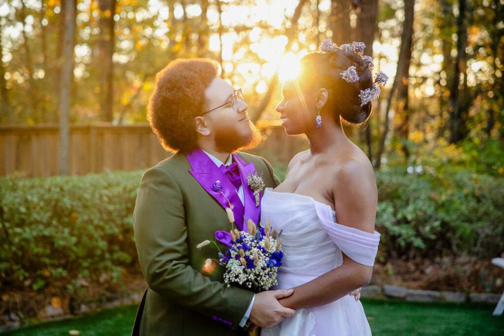 golden hour wedding photo of bride and groom at four oaks manor