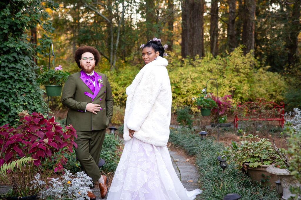 photographer takes photo of bride and groom at their wedding at four oaks mor