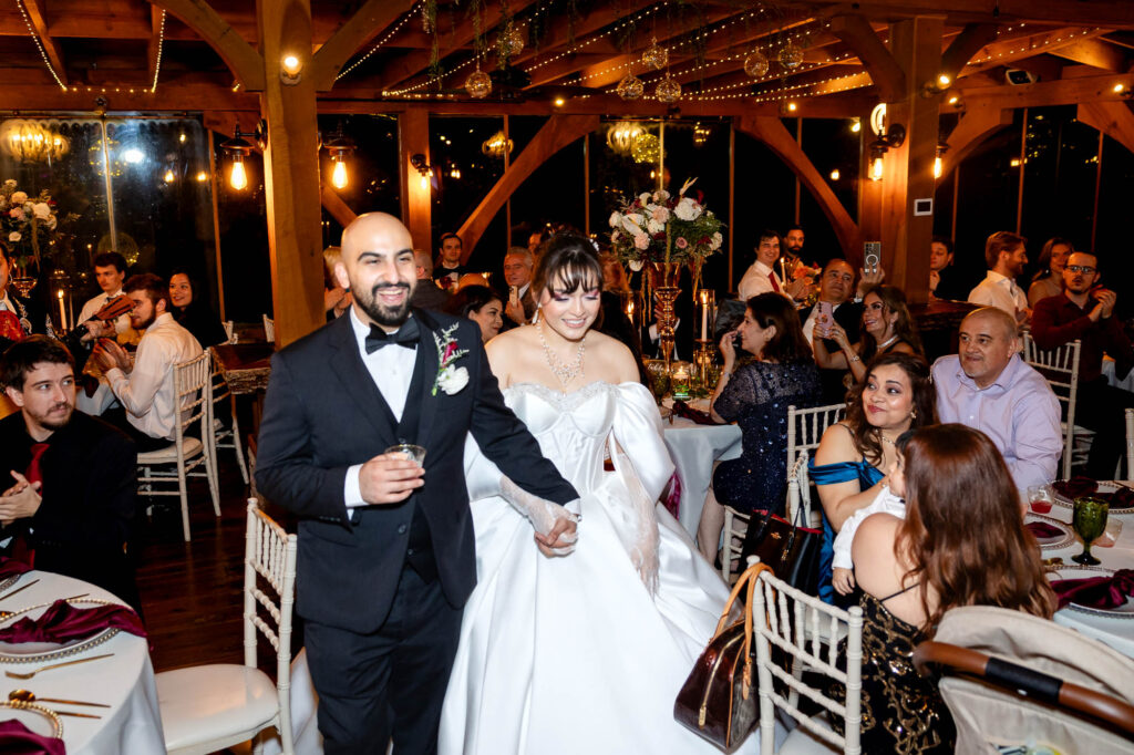 bride and groom entrance to their wedding reception