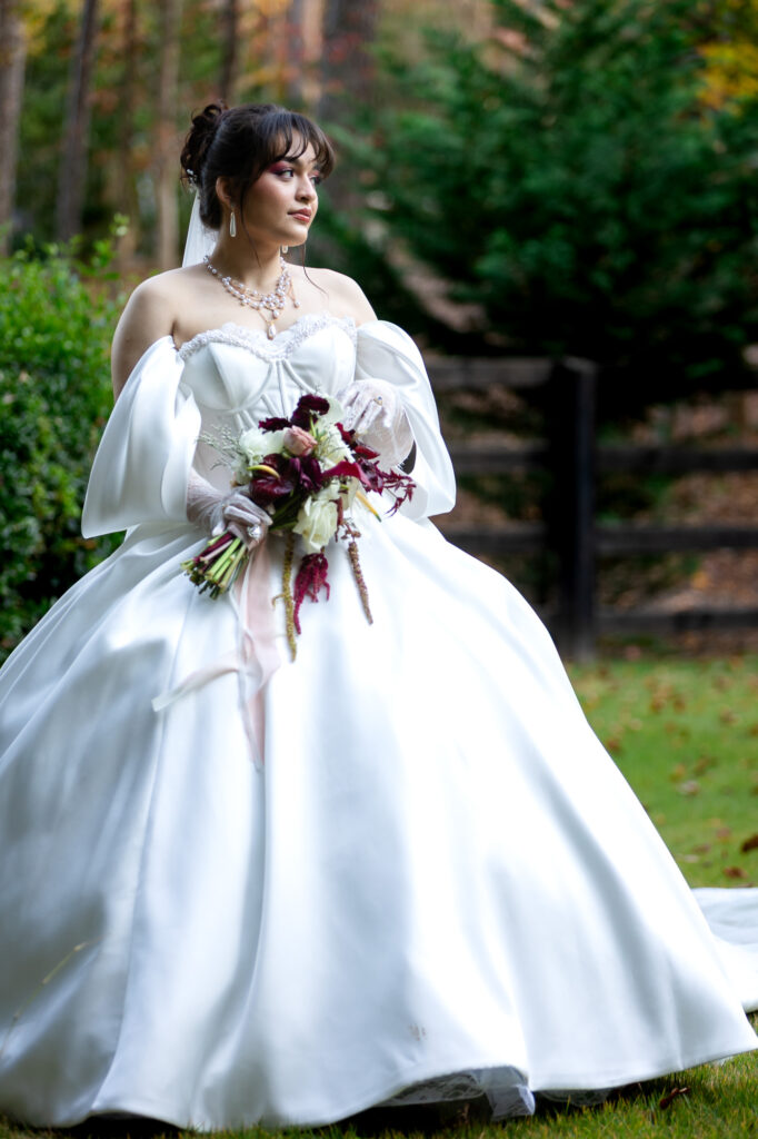 bride taking photos at rocky's lake estate