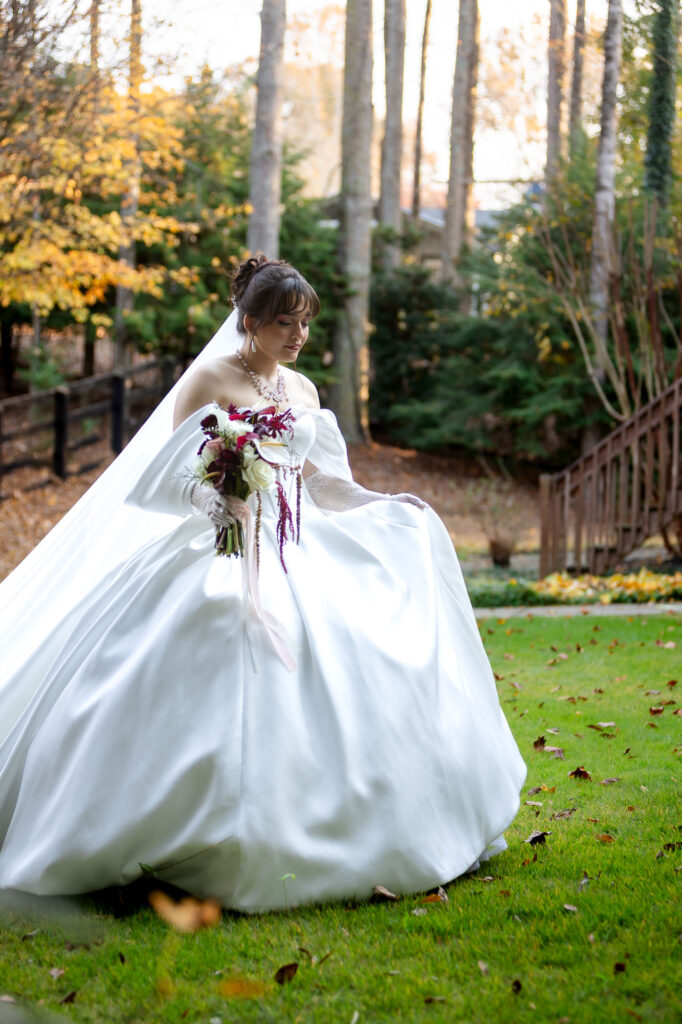 a latino bride walking during her wedding at Rocky's Lake Estate
