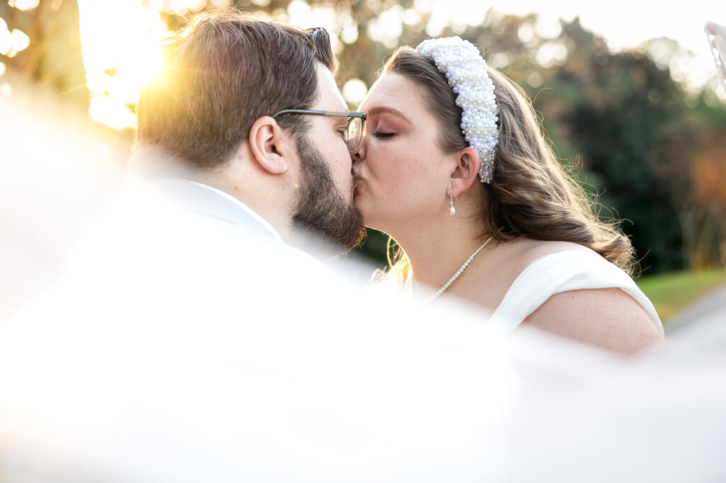 golden hour veil shot at a wedding at beautiful beginnings farm