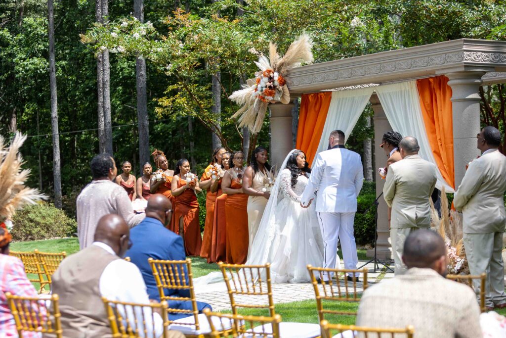 Outdoor wedding ceremony at The Castle at wildwood gardens