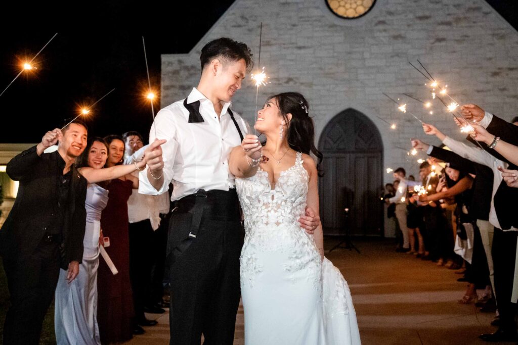 couple at Ashton Gardens doing a sparkler exit