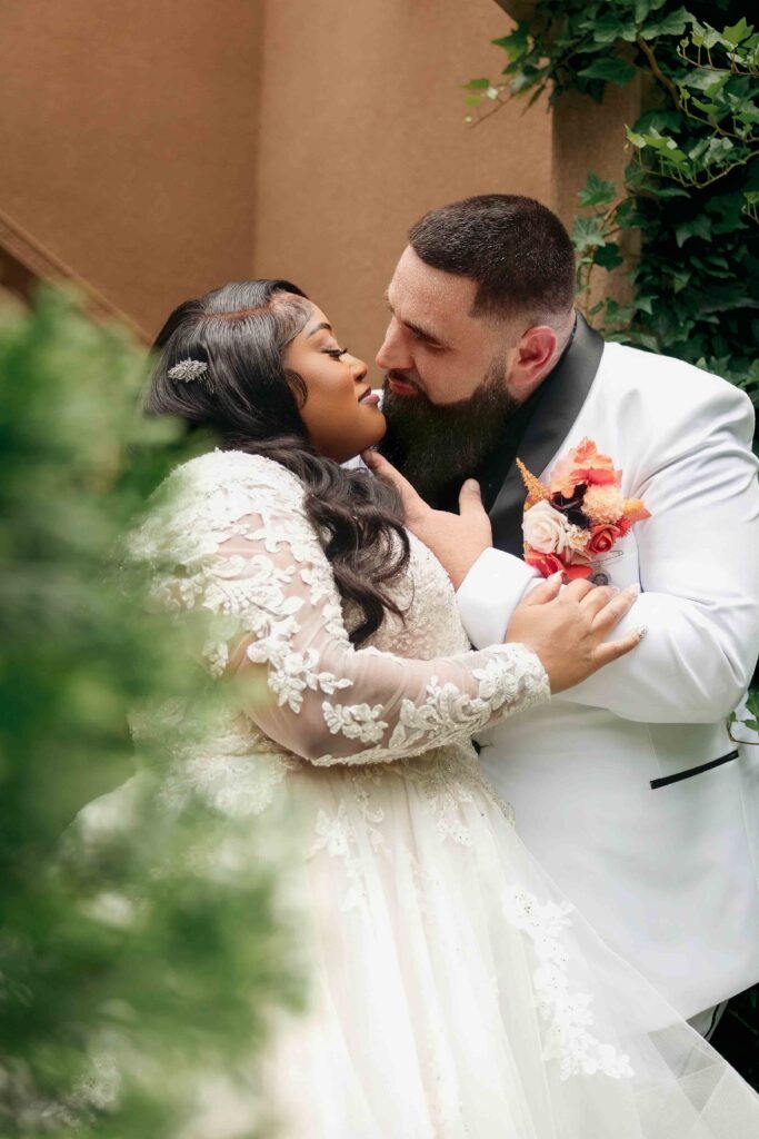 bride and groom shares an intimate moment at castle at wildwood gardens