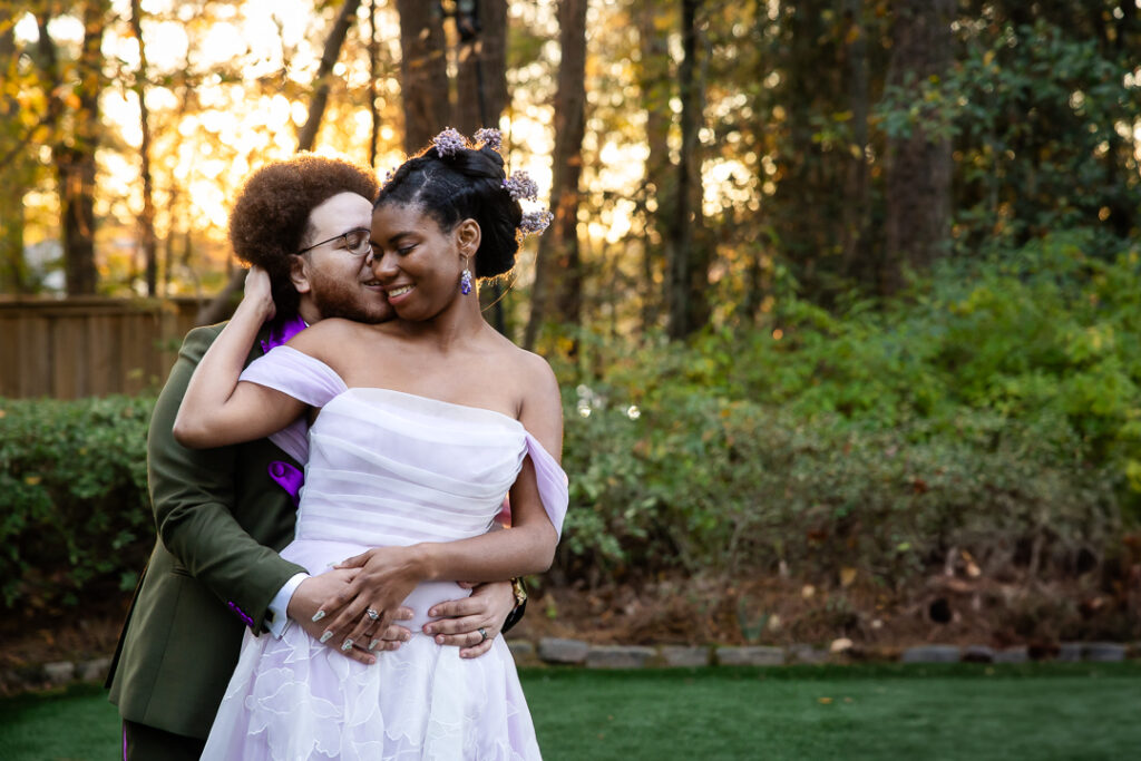 wedding couple poses romantically at four oaks manor