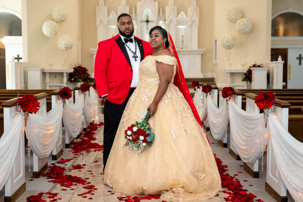 bride and groom pose at pristine chapel