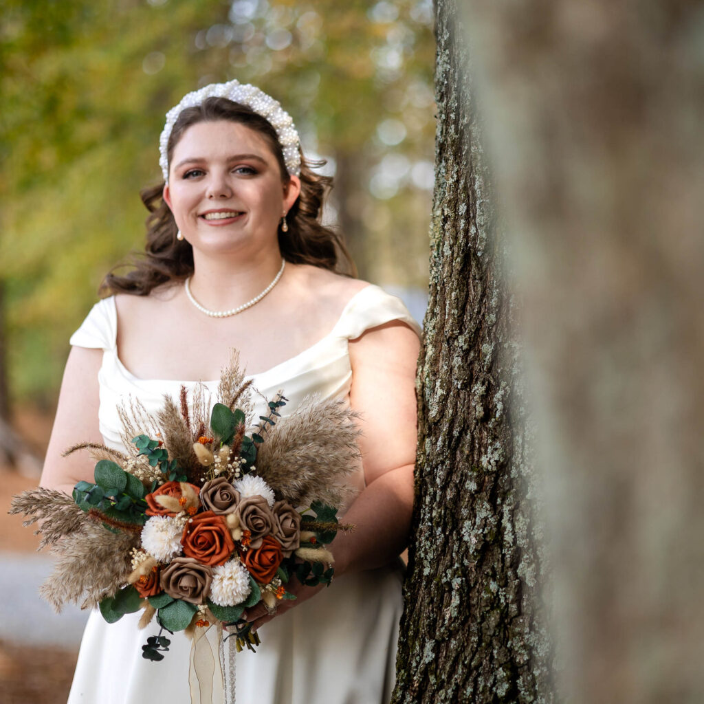 bride poses for her wedding at beautiful beginnings farm 