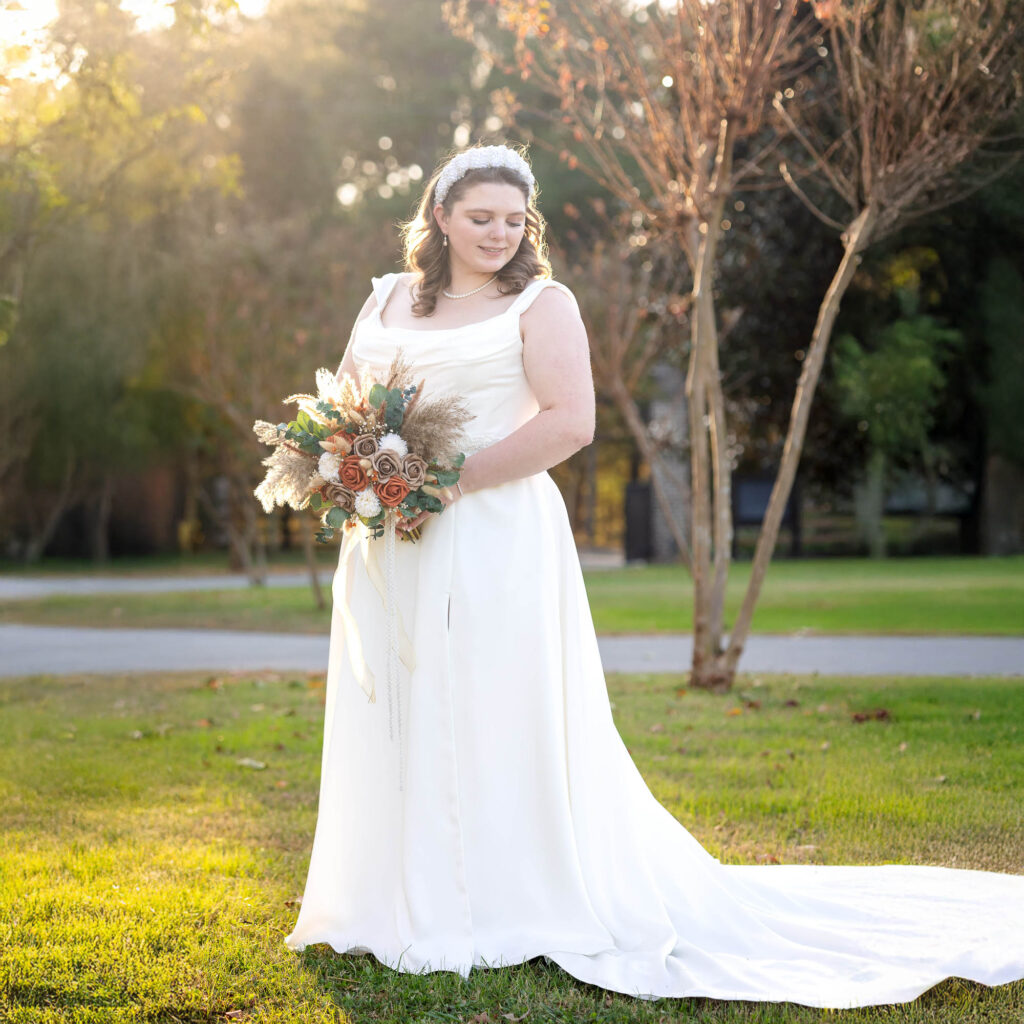 bride poses during at her wedding at beautiful beginnings farm 
