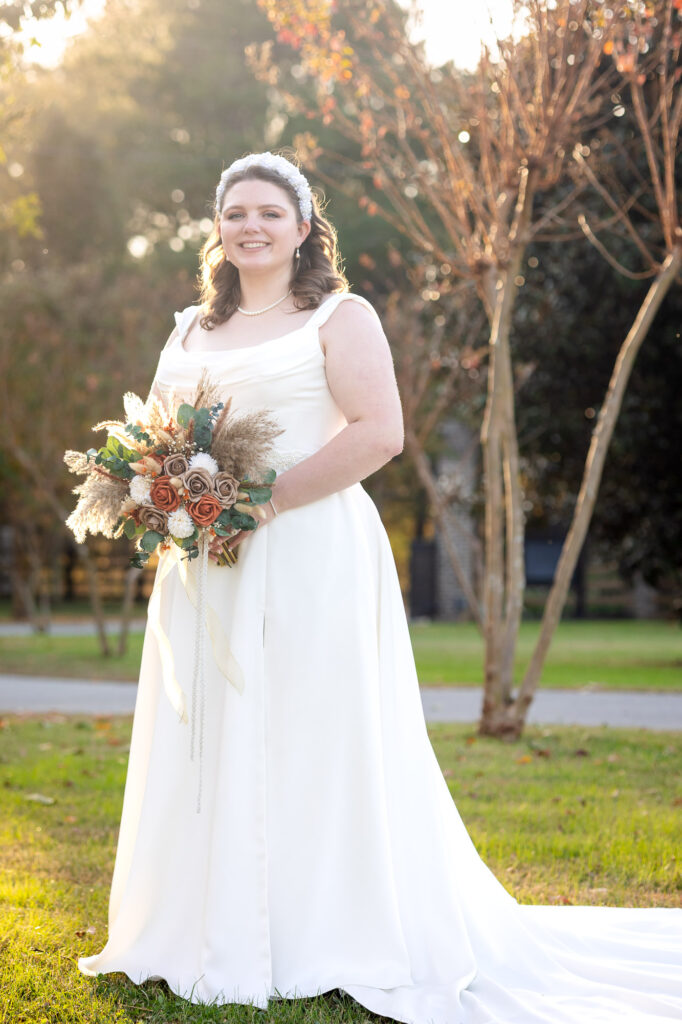 bride poses during golden hour at her wedding at beautiful beginnings farm 