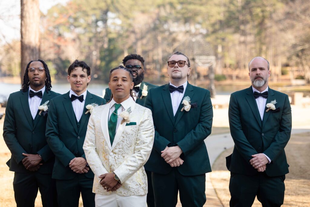 groom and groomsmen posing at Pristine chapel in Atlanta  