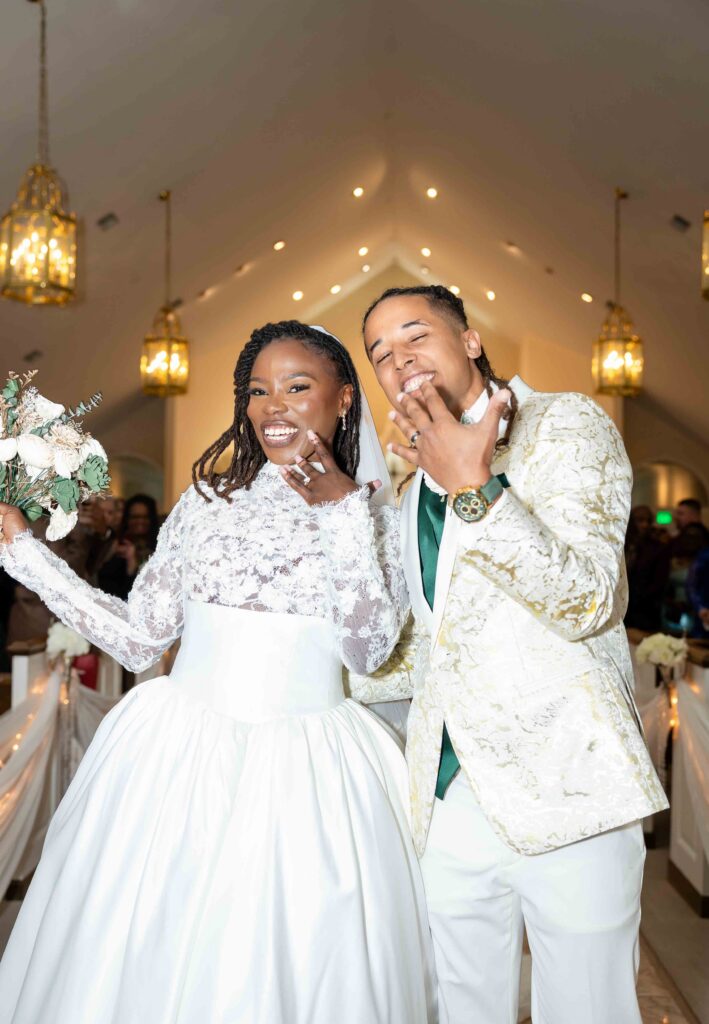 bride and groom celebrating and showing their rings after their wedding at Pristine Chapel in Atlanta 