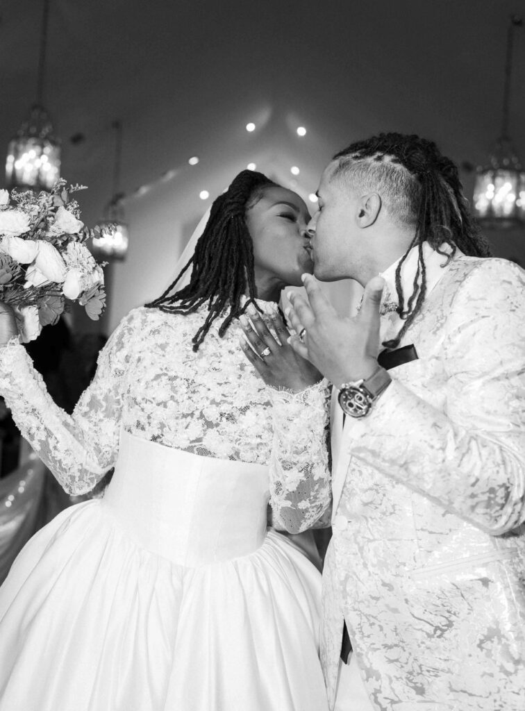 Bride and groom kissing after their wedding ceremony at Pristine Chapel in Atlanta 