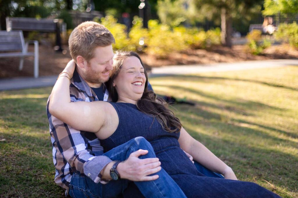 Smiling couple portrait session in Decatur Georgia engagement photoshoot