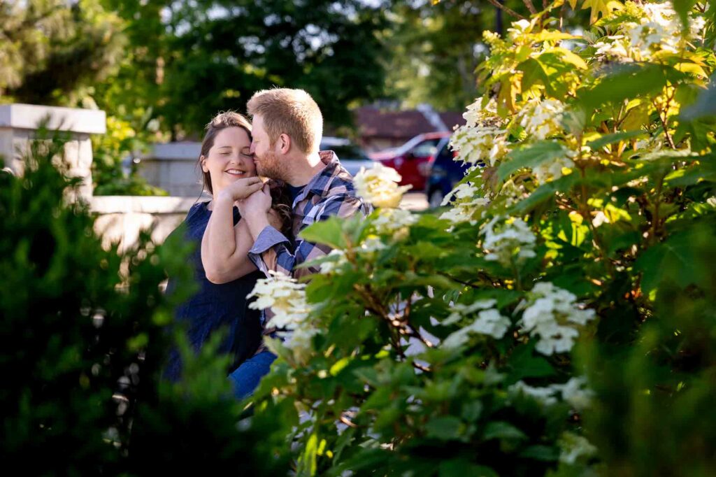 Romantic kiss during engagement shoot in Decatur Georgia city streets