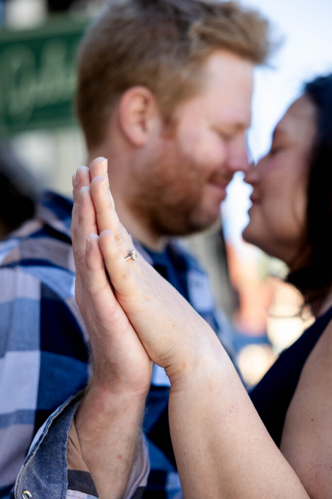 Natural light engagement photography in downtown Decatur with romantic couple